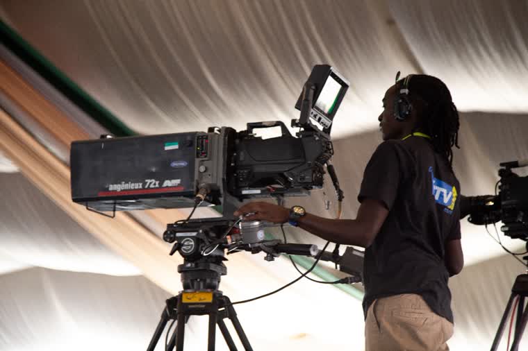 Operator on a long-lens Angénieux broadcast chain