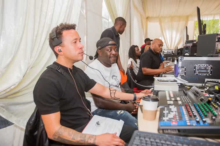 Commentary and sound desk position under a marquee at a live event