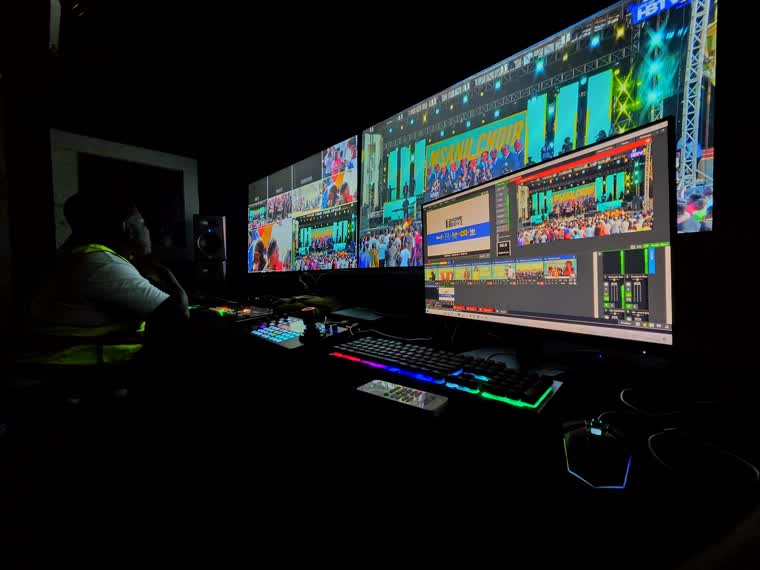 Vision operator cutting a live choir broadcast