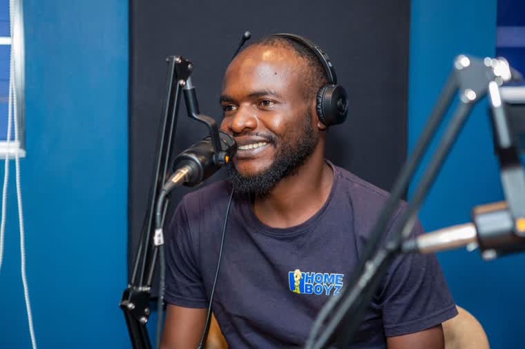 Presenter at the studio microphone